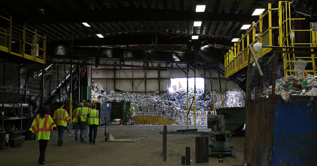 Workers in a Recycling Facility